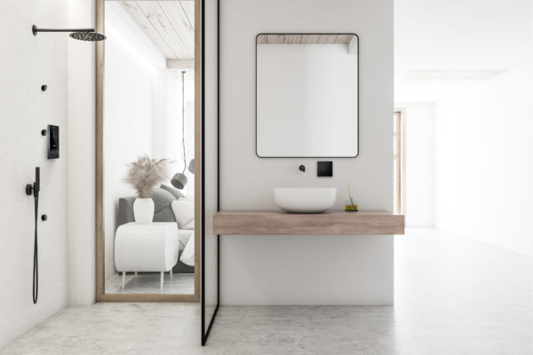 Interior of comfortable bathroom with white walls and floor, light wooden blinds, comfortable white bathtub with round carpet and chair with towels. 3d rendering